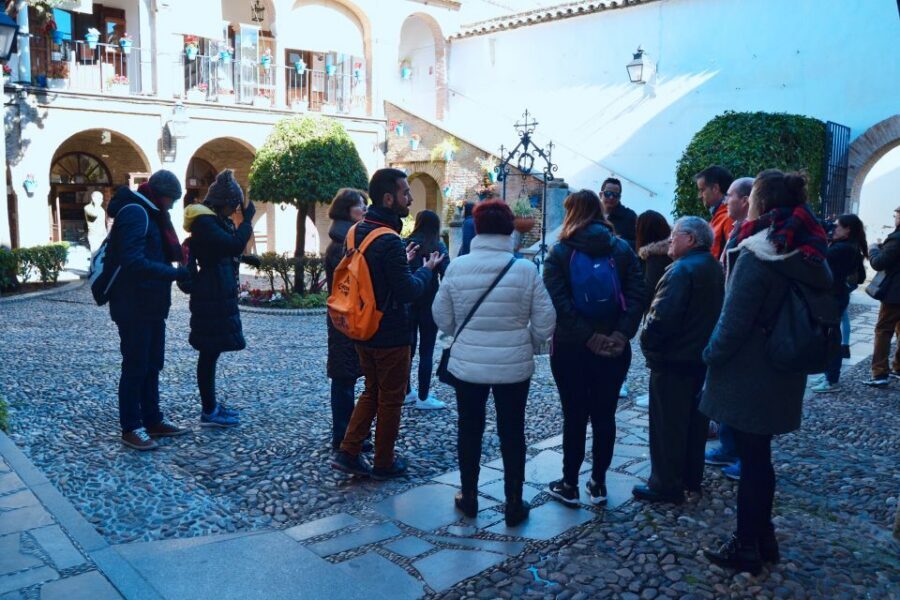 Cordoba: Jewish Quarter Walking Tour - Maimónides and Cardinal Salazar Square: the tour’s human backbone