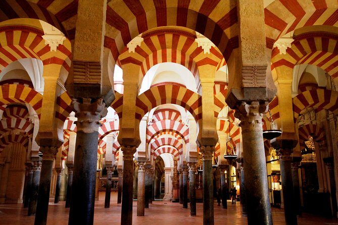 Mosque-Cathedral, Alcazar & Jewish Quarter with Tickets - From the Roman Bridge Gate to your first big photo moments